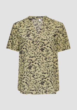 Blusa a maniche corte in tessuto verde chiaro, con un motivo floreale nero, scollatura a V e vestibilità rilassata. Tessuto morbido e leggero.