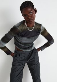 Vero Moda VMMADJA WIDE PANT - Hlače - dark grey melange