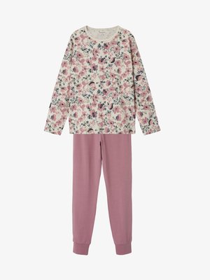 Langarm pyjama top in crème met roze en marineblauwe bloemen, gecombineerd met lichtroze broek met elastische boorden bij de enkels.