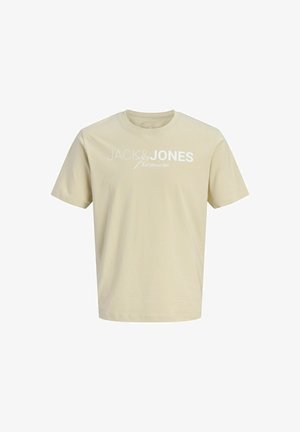 Bež kratka majica s kratkimi rokavi in okrolim izrezom ter belim napisom "JACK & JONES Premium" čez prsi.