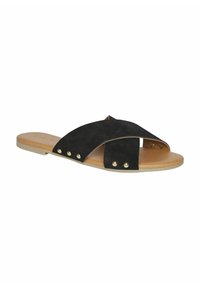 Zwarte suède slide sandaal met kruisbanden en gouden studs. Platter zool met een natuurlijk gekleurde binnenzool, minimalistisch ontwerp.