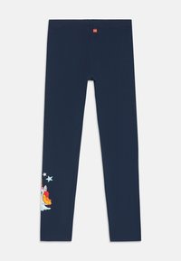 Leggings bleu marine avec un petit logo LEGO sur la taille et un graphique coloré de playset avec des étoiles près de la jambe inférieure gauche.