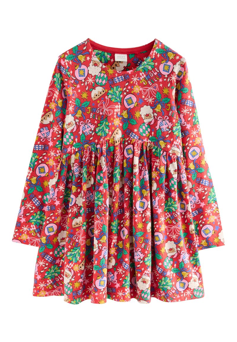 Robe en coton rouge à manches longues, avec une jupe plissée. Décorée de motifs colorés sur le thème de Noël, comme le Père Noël et des ornements.