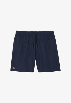 Costumi da bagno blu navy realizzati in tessuto leggero, dotati di un elastico in vita con cordino e di un piccolo logo verde.