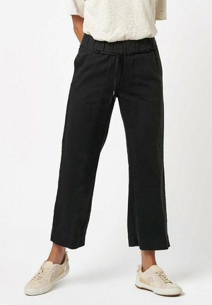 TONI STYLE PIA - Trousers - black