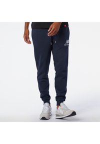 New Balance STACKED LOGO - Pantalones deportivos - eclipse