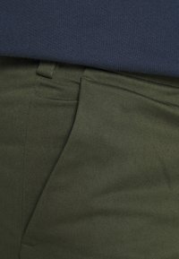 ARKET Tygbyxor - green