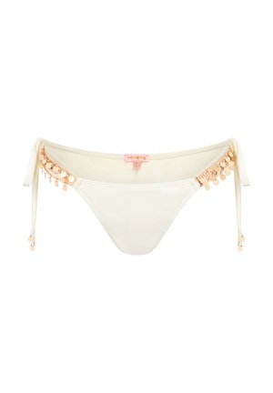 Parte inferiore di bikini bianca con elaborati dettagli in catena color oro e monete decorative sui lati. Lacci ai fianchi per una vestibilità regolabile.