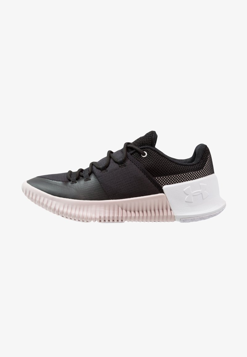 Black athletic shoe with a textured mesh upper, smooth toe cap, and a white heel accent. Features laces and a ribbed sole for traction.