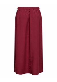 Longue jupe bordeaux avec taille élastique et tissu lisse, tombant droite sans motifs ni ornements.