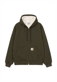 Felpa con zip verde oliva realizzata in tessuto morbido, con interno crema, tasche frontali e una piccola patch con logo sulla tasca sinistra.