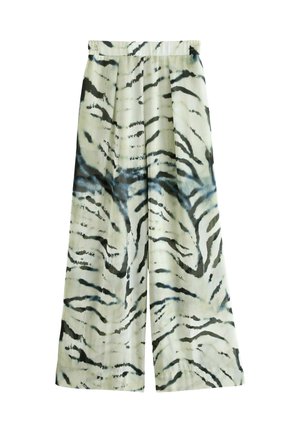 Weite Hosen in einem hellen Cremefarbton mit einem auffälligen schwarz-blauen Tigerstreifen-Muster. Elastischer Bund für zusätzlichen Komfort. Glatte Textur.