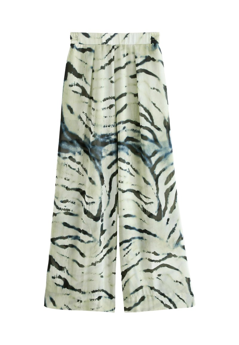 Pantalons à jambes larges d'un léger coloris crème avec un motif audacieux de rayures de tigre noires et bleues. Taille élastique pour plus de confort. Texture lisse.