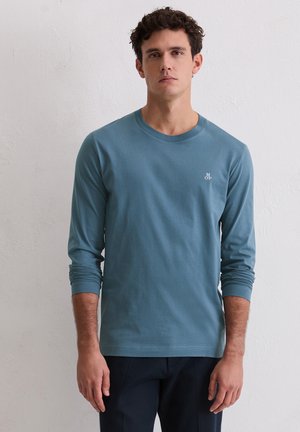 - Bluzka z długim rękawem