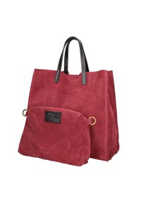 Borsa a tote in suede rosso con accenti in pelle nera, dotata di due manici e una piccola pochette removibile fissata da un anello dorato.