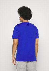 adidas Sportswear Apdrukāts T-krekls - semi lucid blue