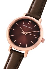 Montre avec bracelet en cuir marron, cadran dégradé marron foncé, boîtier en or rose, index horaires fins et couronne sur le côté droit.