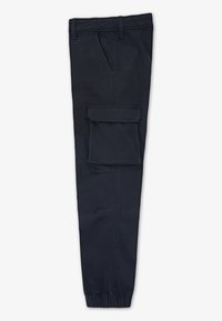 Jūras spēku kravas bikses, izgatavotas no kokvilnas, ar elastīgu jostu, sānu kabatām un lielu kabatu ar atloku labajā kājā.