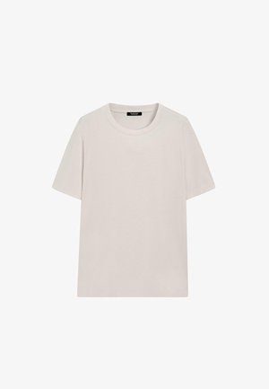 T-shirt a maniche corte e colletto a giro in un leggero colore beige, realizzato in morbido cotone con una texture liscia e un design minimal.