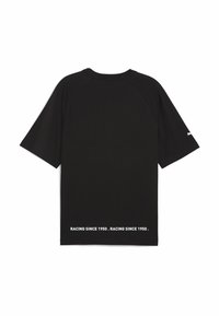 Black cotton t-shirt with short raglan sleeves, featuring white text print that reads “RACING SINCE 1950” along the lower hem.