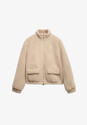 Béžový krátký kabátek z chlupaté látky, s vysokým límcem, předním zipem a dvěma náprsními kapsami.
