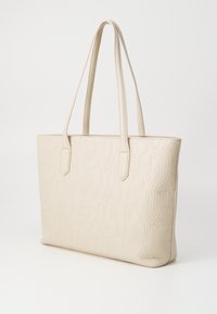 Beige faux leather tote bag with embossed logo pattern, rectangular shape, dual handles, and smooth texture.