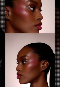 Close-up profile view of a model’s face, highlighting smooth skin with pink blush, glossy lips, and sleek pulled-back hair against a neutral background.