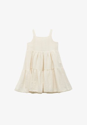 Robe sans manches de couleur crème clair avec un design en couches, un tissu texturé et des détails de l'ourlet festonné.