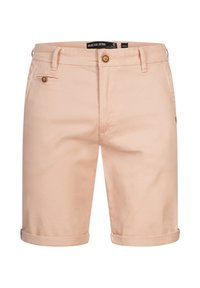 Lyserøde bomuldsbukser med knaplukning, sidelommer og opkrøllede ærmer, med en glat overflade og uden synlige mønstre.