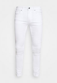 Jean blanc slim ajusté présenté sur un fond clair simple, avec des poches avant et une fermeture à bouton à la taille.
