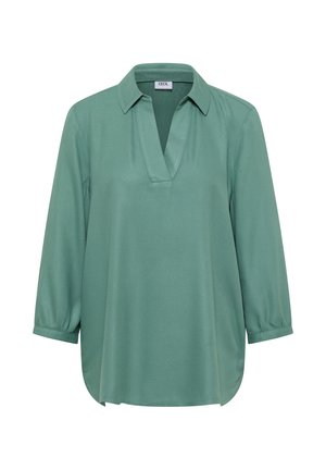 Vihreä pitkähihaisessa puserossa on V-pääntie, kaulus ja k gathered hihansuut, esillä valkoisen taustan päällä.