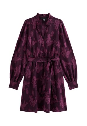 Vestido morado con un estampado floral, mangas largas con puños elásticos, cierre de botones en la parte delantera y un lazo en la cintura para un silueta ajustada.