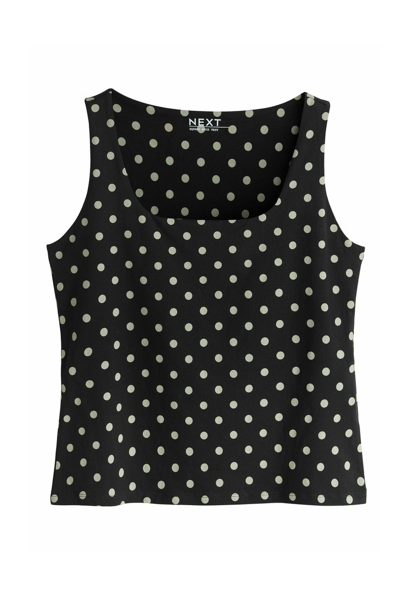 Black tank top with a scoop neckline, featuring a pattern of large cream polka dots. Made of a soft, lightweight fabric.