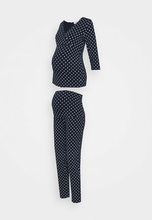 Navy polka dot maternity top and leggings. Soft fabric, V-neck design, three-quarter sleeves, and stretchable waist for comfort.