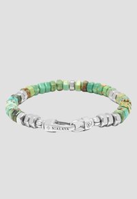 Turquoise beaded bracelet with hexagonal stones and metallic silver accents. Features a secure clasp with engraved branding detail.