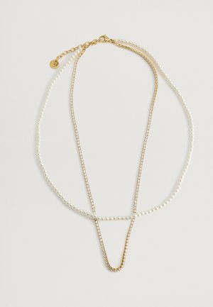 Collana a strati in oro e perle che presenta una scintillante catena di strass e un gancio regolabile con prolunghe in catena.
