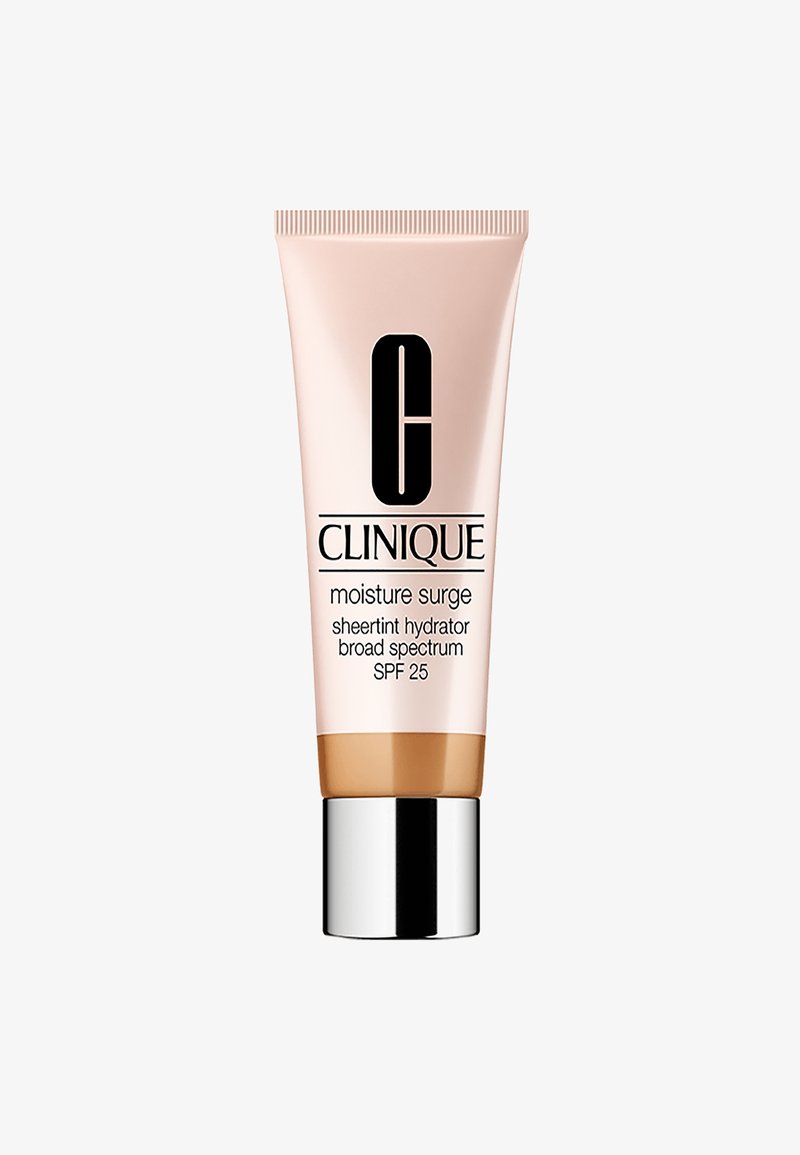 Clinique Moisture Surge-rör, mjuk rosa plast, svart text, silverlock, innehåller genomskinlig tonande fuktkräm, SPF 25, bredspektral skydd.