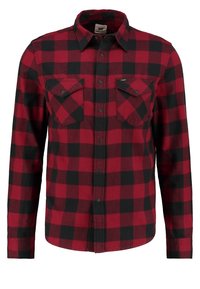 Czerwona i czarna koszula flanelowa w kratę, z długimi rękawami, kołnierzykiem zapinanym na guziki oraz dwoma kieszeniami na piersi. Miękka w dotyku z wzorem w kratę.