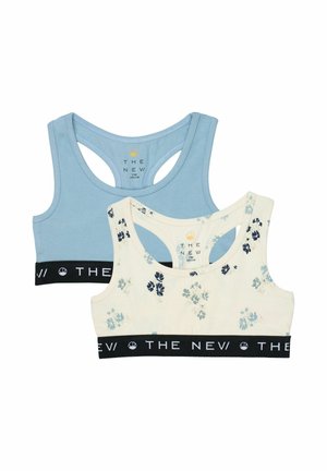 Deux brassières de sport pour enfants, une bleu clair et une blanche avec un imprimé floral bleu, toutes deux avec des bandes élastiques noires indiquant "THE NEW".
