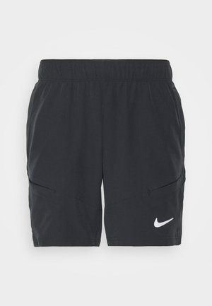 Shorts deportivos negros de tejido ligero, con una cintura elástica, bolsillos laterales y un logo blanco de Nike en la parte inferior de la pierna izquierda.