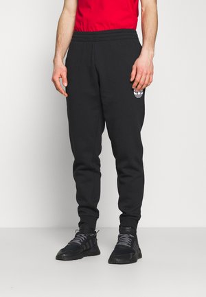 UNISEX - Tracksuit bottoms - black