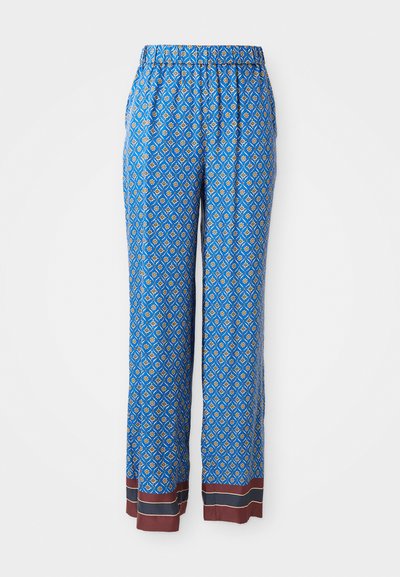 Μπλε παντελόνι με μοτίβο διαμαντιού σε κίτρινες και λευκές λεπτομέρειες. Διαθέτει ελαστική μέση και καφέ φινίρισμα στο στρίφωμα.