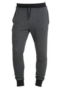 Under Armour Teplákové kalhoty - black