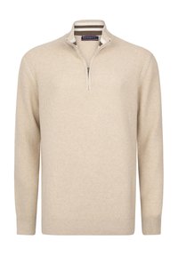 Beige vetoketjullinen neulepaita, joka on valmistettu teksturoidusta kankaasta ja jossa on pitkät hihat sekä resorireunat hihoissa. Koristeltu raidallisella kauluksen yksityiskohdalla.