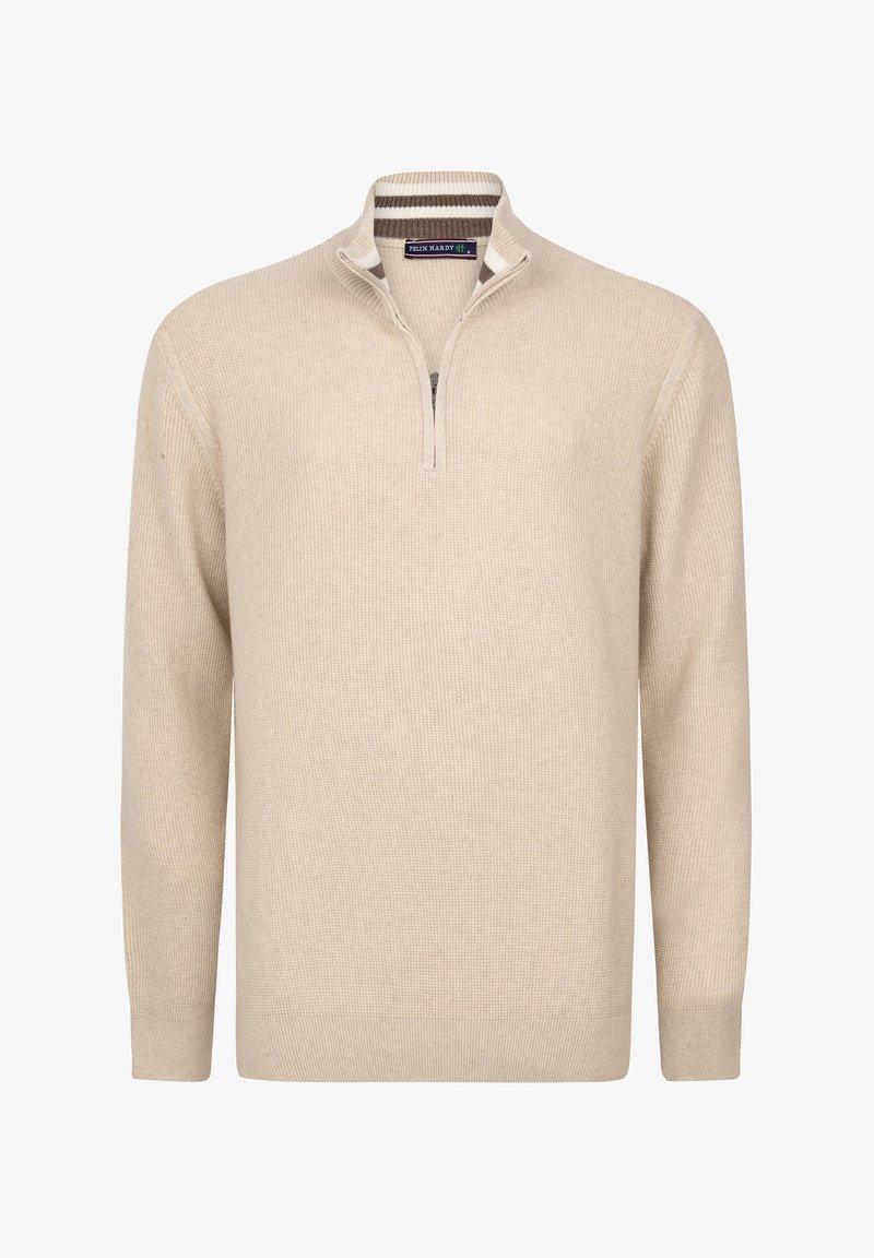 Beige vetoketjullinen neulepaita, joka on valmistettu teksturoidusta kankaasta ja jossa on pitkät hihat sekä resorireunat hihoissa. Koristeltu raidallisella kauluksen yksityiskohdalla.