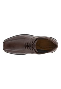 Brown leather dress shoe with a square toe shape, lace-up design, and subtle stitching details. Smooth texture with a tapered sole.