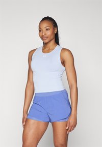 Under Armour TRAIN SEAMLESS - Topper - celeste/white