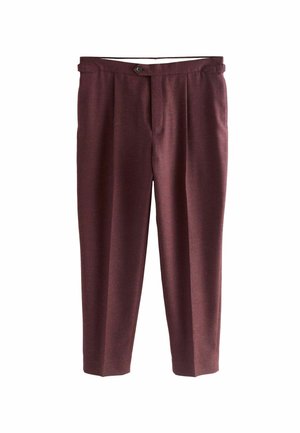 Burgunderfarbene Tailor-Hosen mit glatter Textur, versehen mit einem einzelnen Knopfverschluss und Falten, entworfen für eine figurbetonte Silhouette.