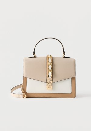 Beige, white, and tan structured handbag with top handle, gold chain detail, and a gold clasp, against a plain light background.