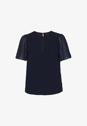 Marineblå bluse med korte, gennemsigtige puffærmer, tekstureret polka prikket mønster overalt og en nøglehulslukning på ryggen.